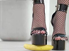 Watch this petite brunette crush fruits under high heels! Hot foot fetish
