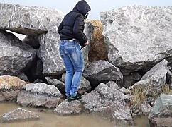 milf pisses wildly in the sea with hairy pussy outdoors!