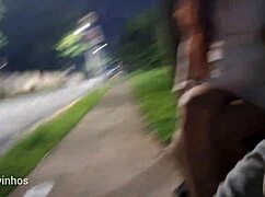 Risky redhead street handjob blows load in public view