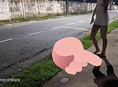 Risky redhead street handjob blows load in public view