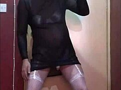 Crossdressing sissy slurps piss cum mix from glass