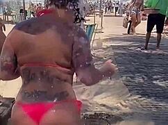 Who wants to see me sucking that huge black cock on the beach?