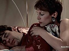 Jamie lee curtis bares big tits in retro blue film handjob scene