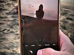 unknown beach babe gives public blowjob to muscular stranger