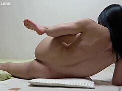 beautiful japanese girl shows off jet black hair and BIG TITS nude on cam