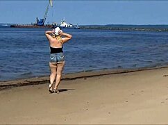 big asses squeeze into tight jeans shorts on the beach