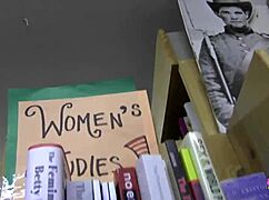 brunette bookworms sneak pussy licks in the library stacks