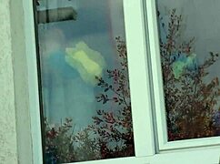 taxi driver spies naked milf in stockings washing windows without panties