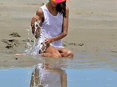 i'm that skinny latina model nude on public beach with small tits