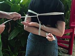 oh man i got this park beauty all bound up outdoors tickling her till she moans...