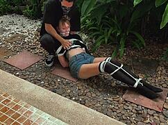 oh man i got this park beauty all bound up outdoors tickling her till she moans...