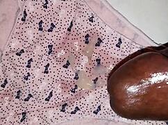 Ebony mature moans loud jerking thick cock close-up in homemade clip