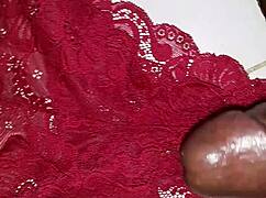 Ebony mature moans loud jerking thick cock close-up in homemade clip