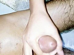 OIL MASSAGE HANDJOB! indian sister strokes stepbro's big dick close up