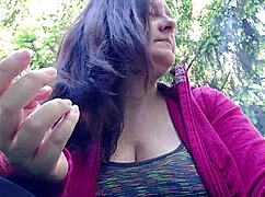 oh man nicoletta's lighting up in the garden then yanks out those huge tits for ya...