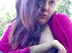 oh man nicoletta's lighting up in the garden then yanks out those huge tits for ya...