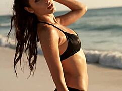 Bikini Skinny Girl Model Poses Seductively On Beach.