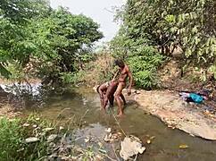 damn this curvy ebony babe flashes her fat body ready for devouring by the stream...