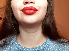 romanian curvy brunette smokes cig with big red lips pov