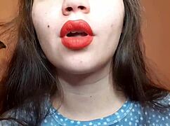 romanian curvy brunette smokes cig with big red lips pov