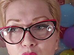 Mature bitch dildos juicy pussy amid colorful balloons