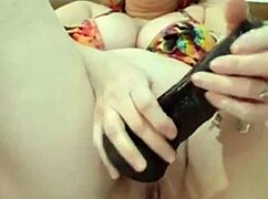 Mature Blonde Stuffs Big Pussy Lips with Black Dildo Anal