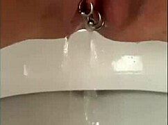 Pierced Clit Dripping Piss Closeup Tease