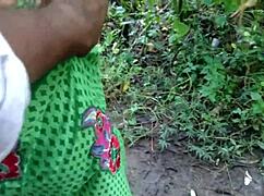 Aunty pees outdoors then takes huge cock pounding in jungle spot