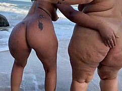 damn my amigas meet up on beach and start licking pussies right there in public everyone watching 😲