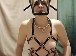 feeling enslaved submission in tight harness session