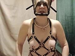 feeling enslaved submission in tight harness session