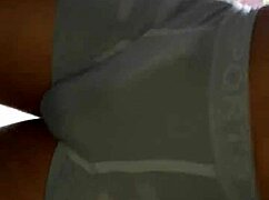 guy's hard cock bulging in tight outdoor shorts