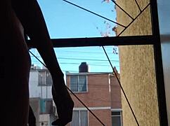 practicing nudism outdoors in public with full body exposure and natural freedom