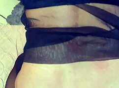 What happens when black stockings hug her curves in this homemade wife clip?