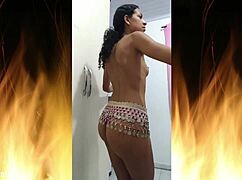 pretty curly latina housewife flashes juicy ass in fishnets up close