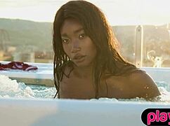 hey petite ebony milf slowly strips juicy tits poolside showing off curves