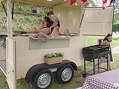 Ever seen a tattooed brunette babe bent over a pizza truck counter getting railed doggystyle by two guys?
