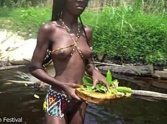 Skinny ebony tribe girl from Africa spreads pussy outdoors in the forest!