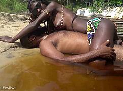 Skinny ebony tribe girl from Africa spreads pussy outdoors in the forest!