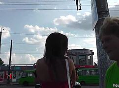 Bus stop cutie flashes skirt in sneaky upskirt tease