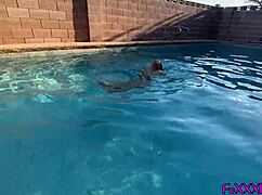 Blonde bombshell kneels poolside for massive cock suck in public 4K POV