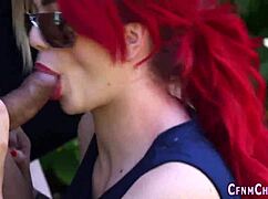 Bossy dominas suck loser in uniform outdoors