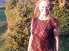 grandma flashes natural tits in sheer bodysuit while wearing heels outside