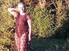 grandma flashes natural tits in sheer bodysuit while wearing heels outside