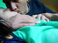 kissing and pressing girlfriends boobs