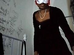 goth dominatrix teases with heels