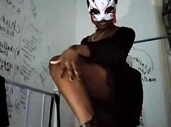 goth dominatrix teases with heels