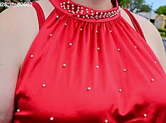 beautiful woman walking outdoors in public parking lot showing off for strangers
