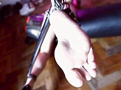 captive latina moans helplessly during intense foot tickling