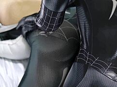 indonesian asian couple has fun in spiderman costumes at home